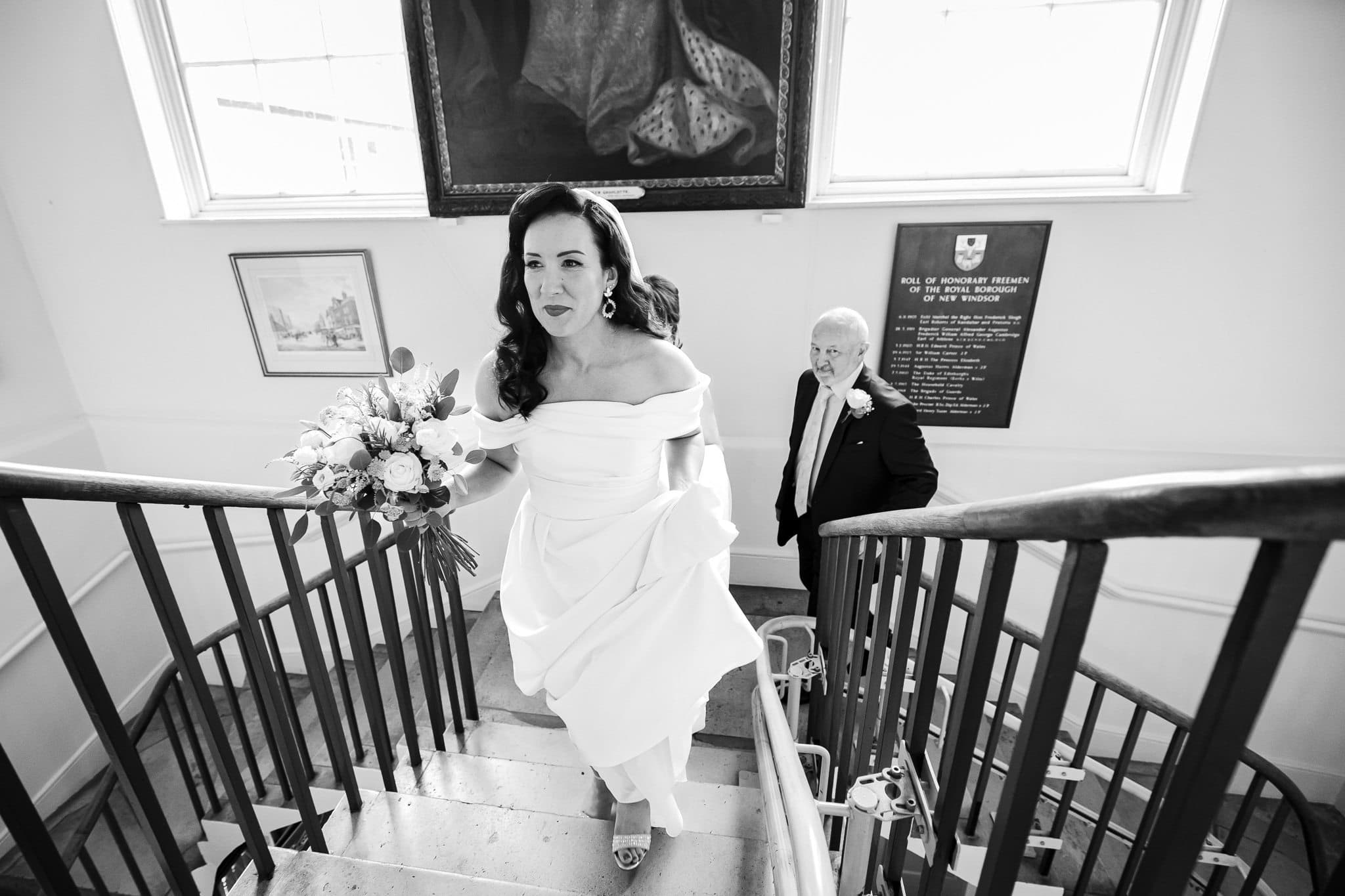 bride walking up stairs